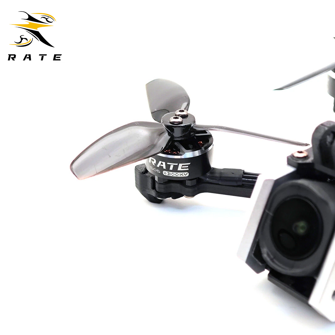 Macro close-up of RATE custom brushless motor with printed KV marking and transparent propeller for S30 O4 3-inch FPV drone, precision power component for stable freestyle flight.