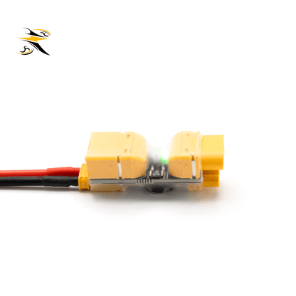 RATE Short Circuit Protector Rear View With Power Indicator Light
ALT Text: Rear side photo of RATE XT30 XT60 battery anti-short plug with glowing green status LED, overcurrent protection for FPV quad LiPo batteries.